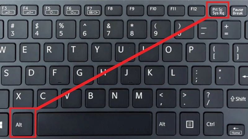 Nhấn cùng lúc 2 phím là Alt + PrtSc