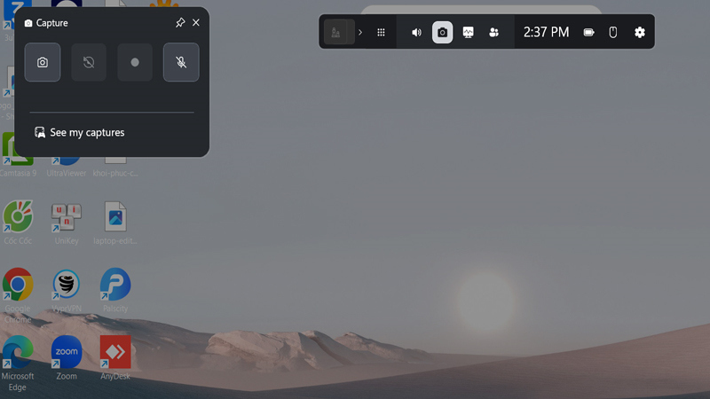 Nhấn vào nút có hình camera